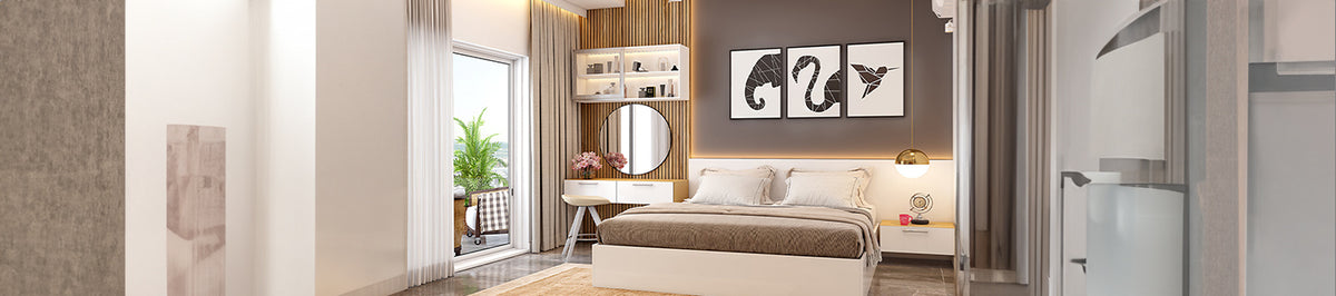 Modern bedroom with a bed, round mirror, dressing table, framed wall art and pendant lighting