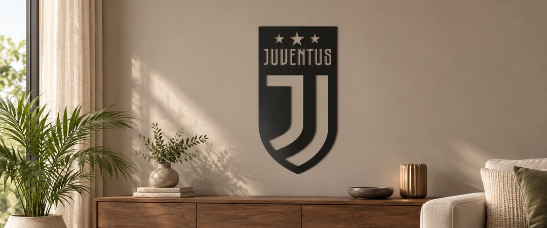 Black Juventus-inspired football wall art above a walnut sideboard in a sunlit lounge
