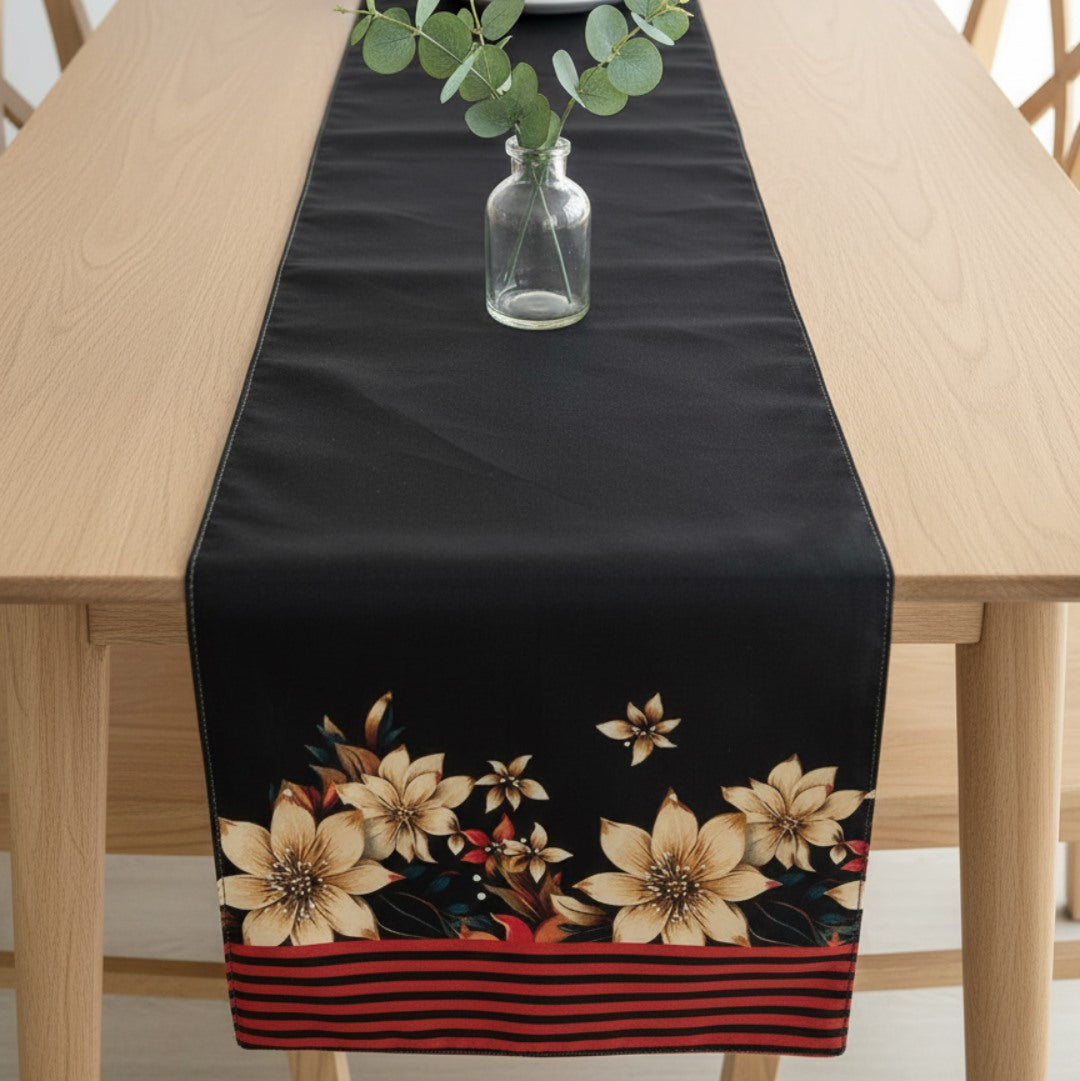 Black floral table runner with red striped border