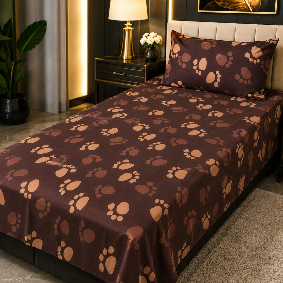 Chocolate brown and tan kids single bed sheet with all-over paw print