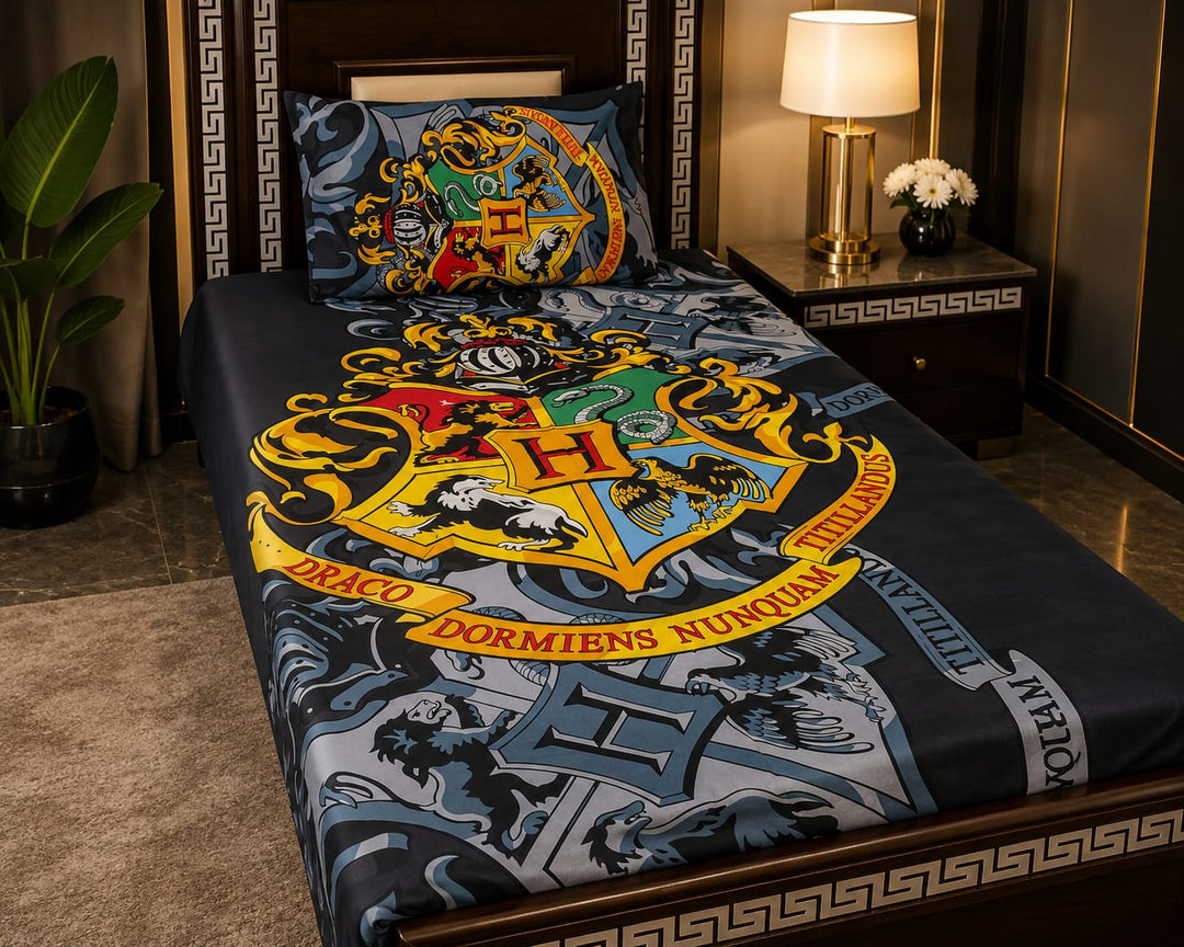 Navy kids single bed sheet with a gold four-house crest emblem