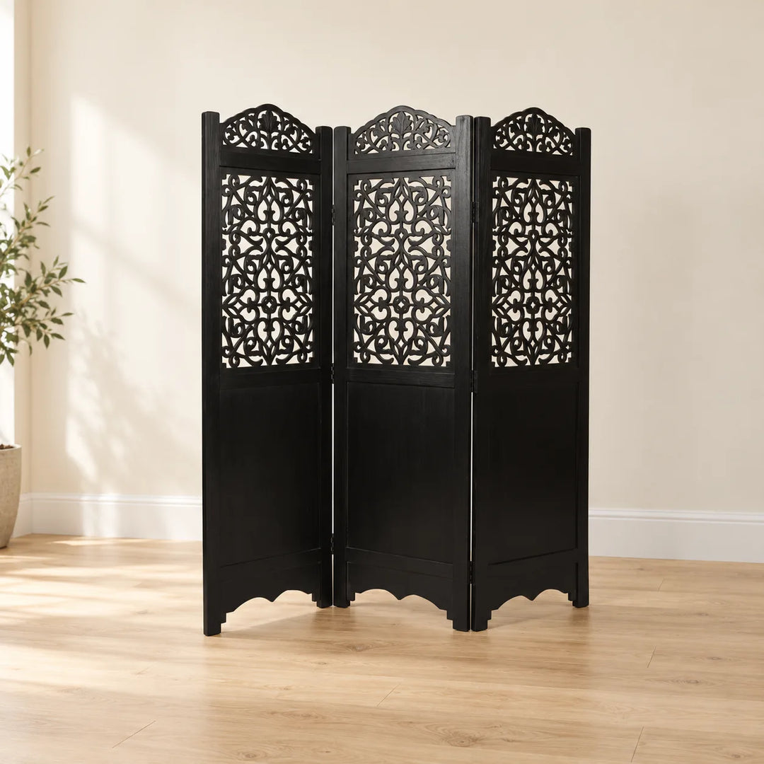 Black Artesia Style 2 three-panel room divider with curved crests and original carved lattice in a softly lit room