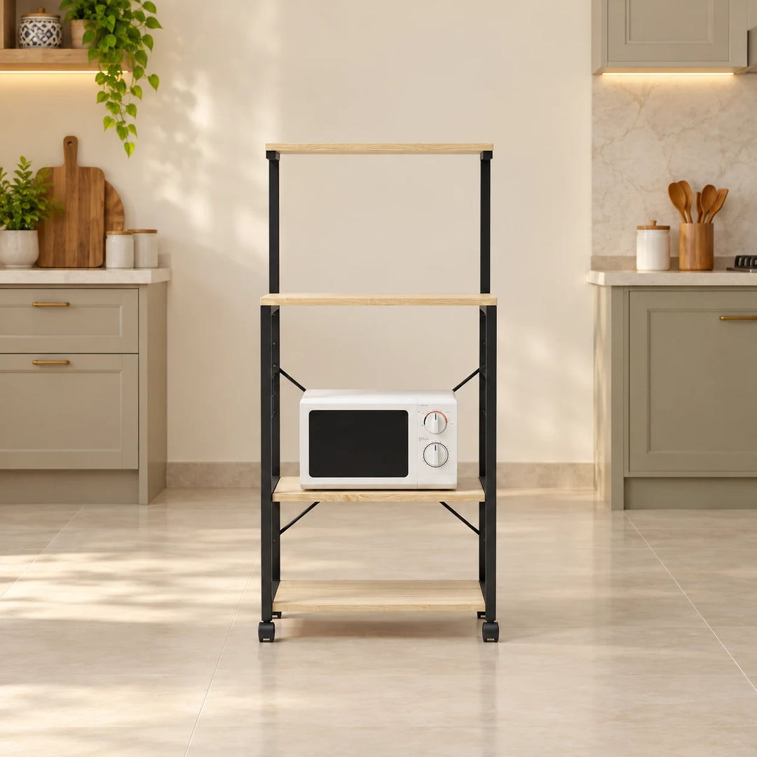 Bipartite pale wood four-tier kitchen rack with wheels, black frame and microwave in a warm kitchen