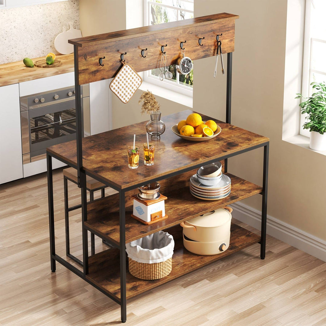 Angled top view of kitchen island rack with fruit bowl and hanging utensils