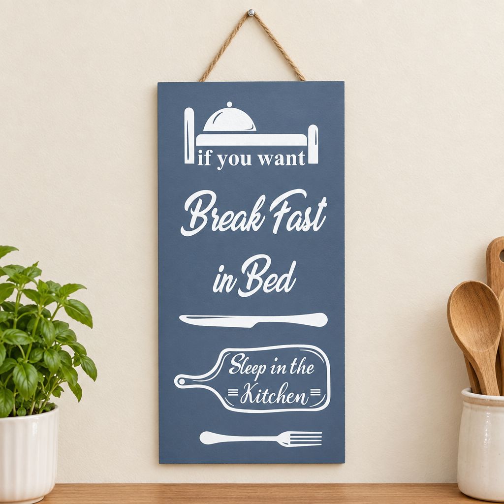 Dark grey wall caption decor plaque with Breakfast in Bed text in kitchen