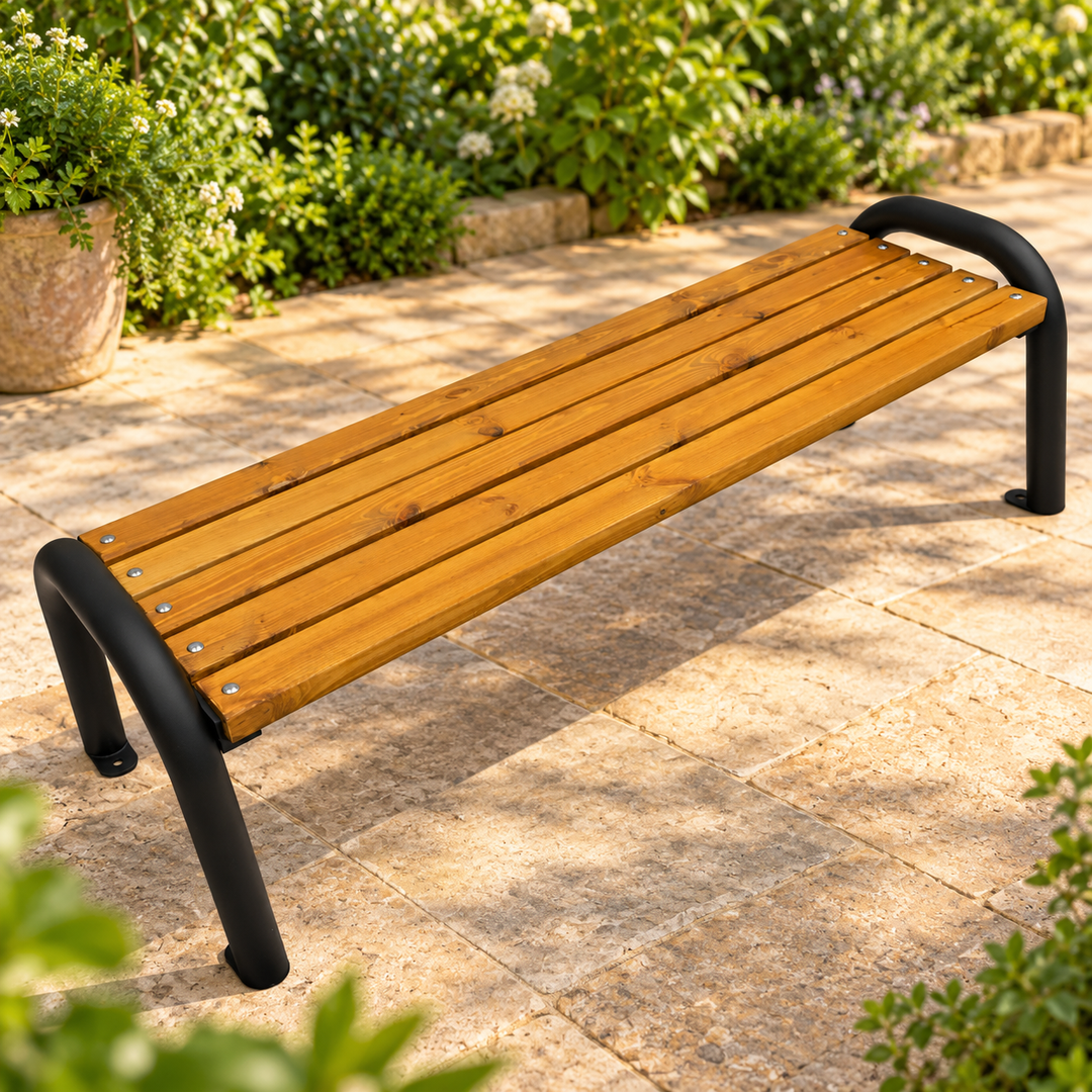 Honey brown five-slat Candina backless bench with black curved metal legs on a sunny garden patio