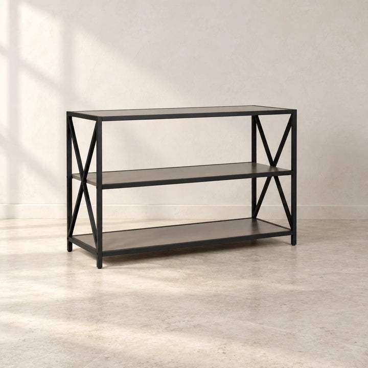 Carbon three shelf console rack with black X frame sides in natural light