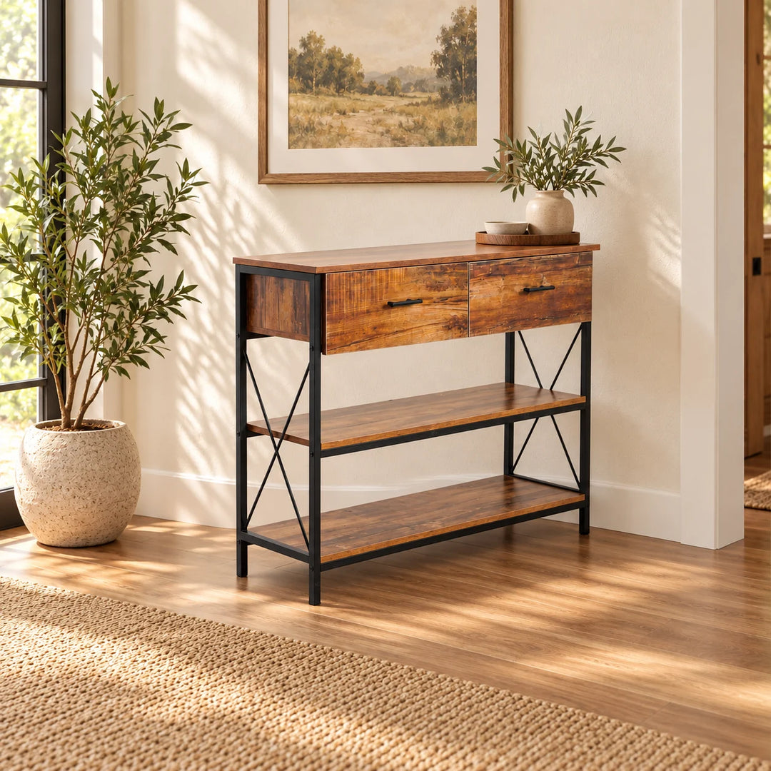 Rustic two drawer console table with black X frame sides styled in an entryway