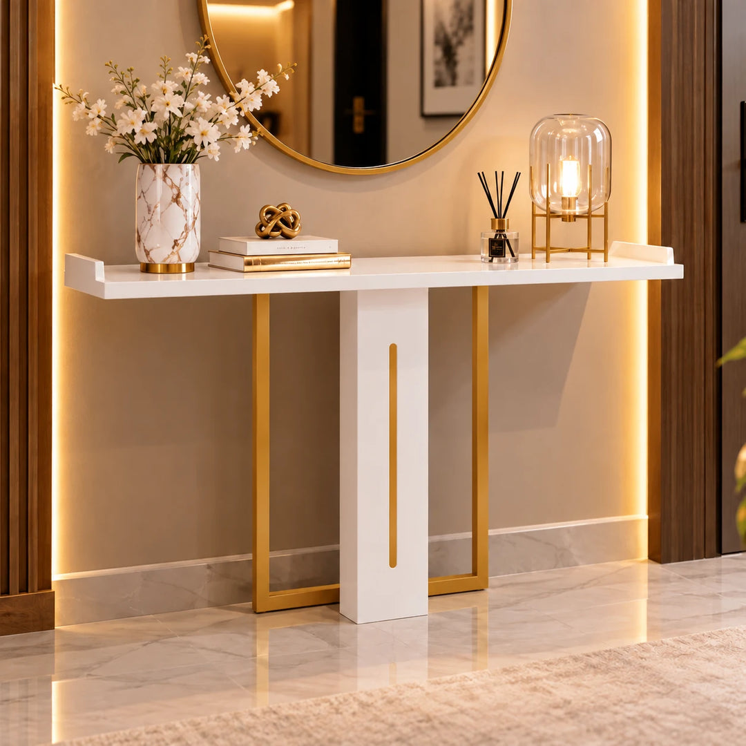 Constitute white console table with Akil Gold powder-coated rear frame and slim gold accent in a warm entryway