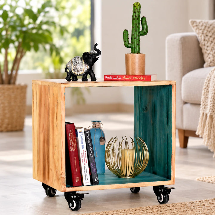 Open wooden rolling cabinet with teal interior in a living room