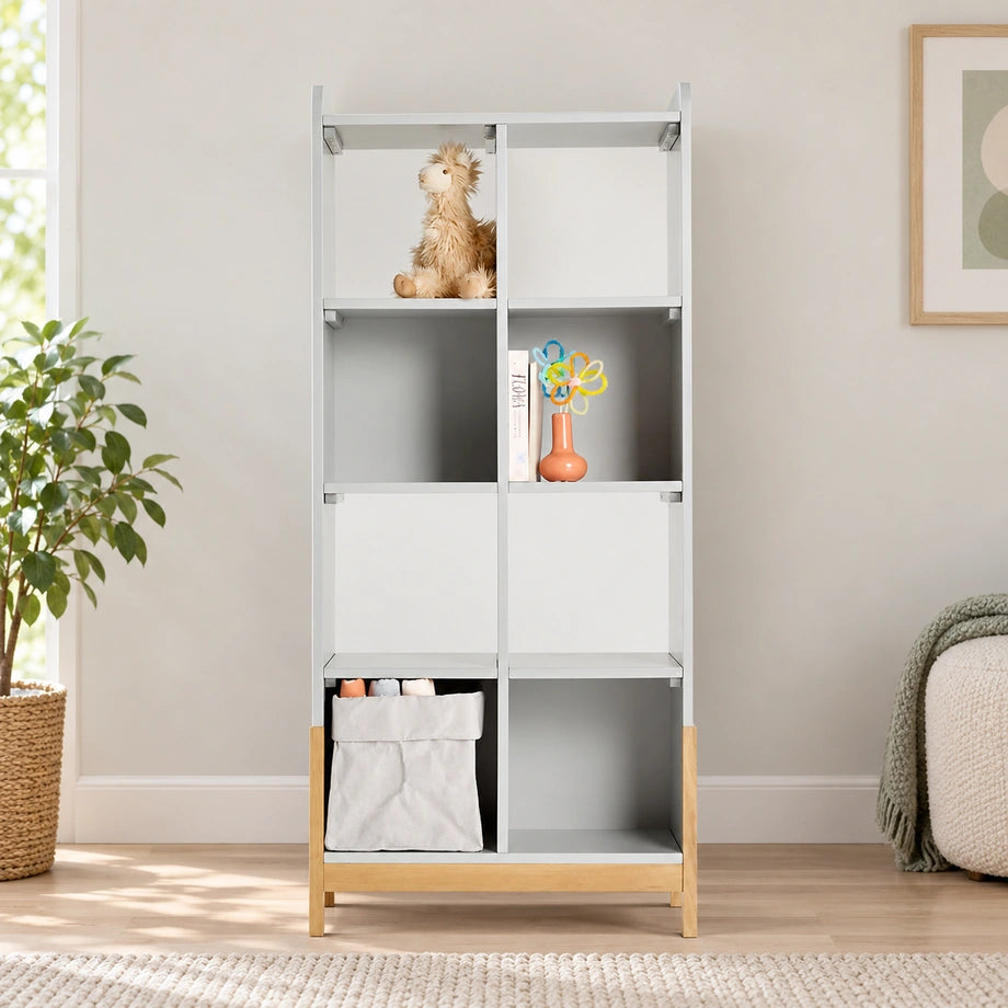 Cubic Knots eight-cube grey bookcase with natural wood base in a bright room