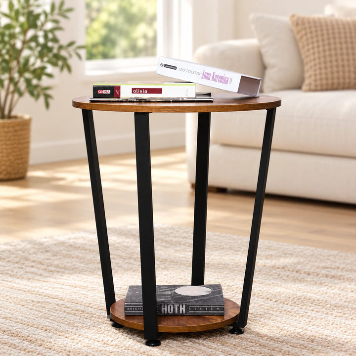 Brown two-tier round side table with black frame in a sunlit lounge