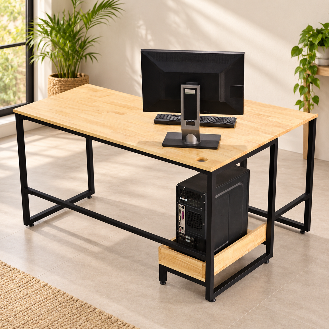 Ducolo light wood desk with black frame and lower computer tower tray in a sunlit office