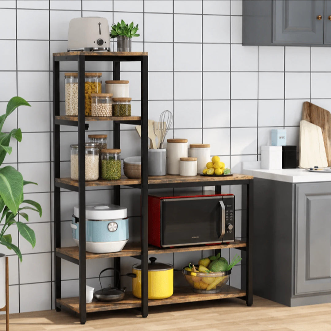 Eemaan five-tier kitchen baker rack in Brown with pantry jars, cookware and plant against a tiled wall