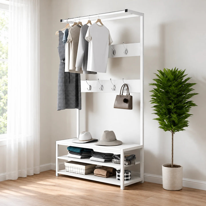 White Feline entryway hall tree with bench, coat hooks and shoe shelves against a wall
