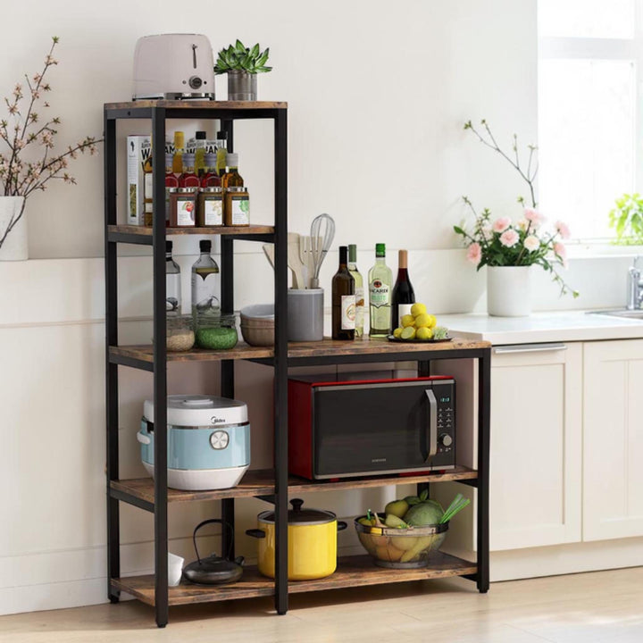 Freestanding baker’s rack with adjustable feet and open storage shelves