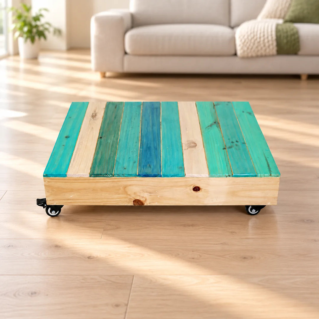 Hellene low serving table with original teal and natural wood planks in a lounge setting