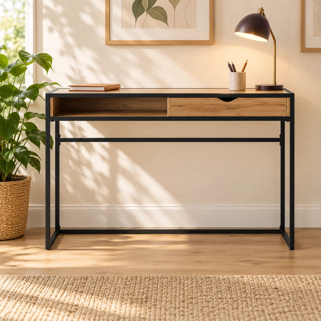 Hinora writing desk with drawer and open cubby styled with a lamp and natural plant