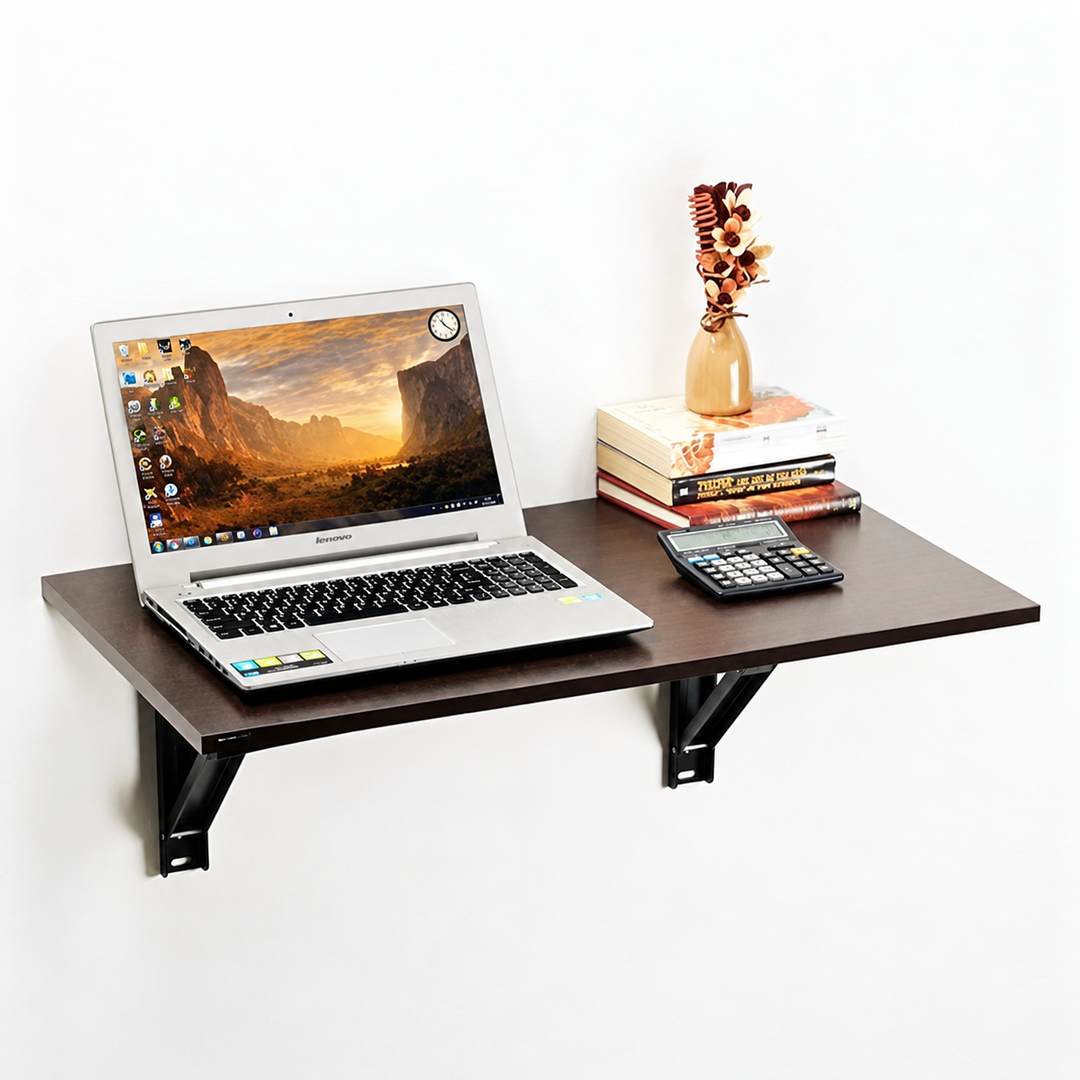Dark brown wall-mounted folding desk used as a laptop workstation