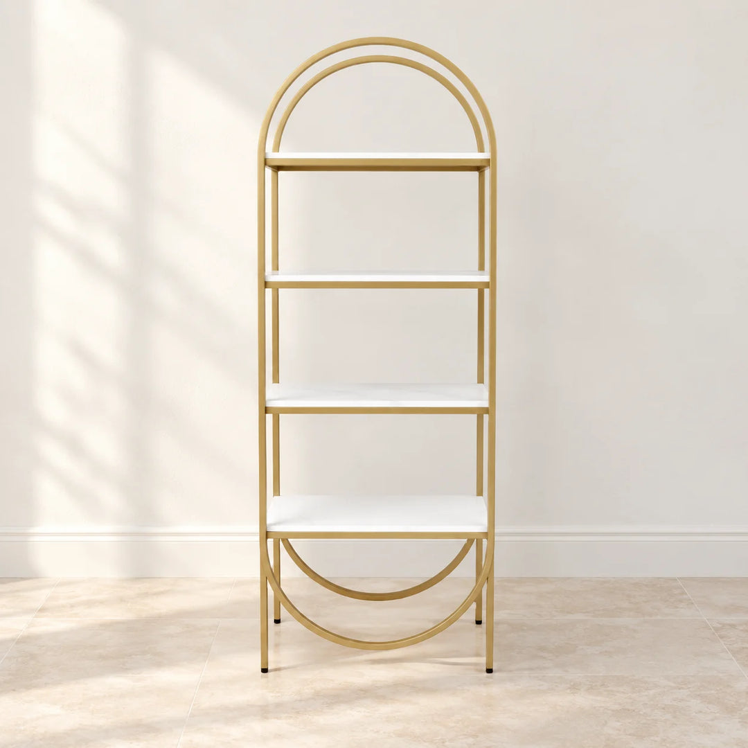 Jailey four shelf bookcase with white shelves and gold double arches in natural light