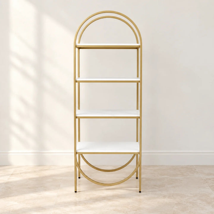 Jailey four shelf bookcase with white shelves and gold double arches in natural light