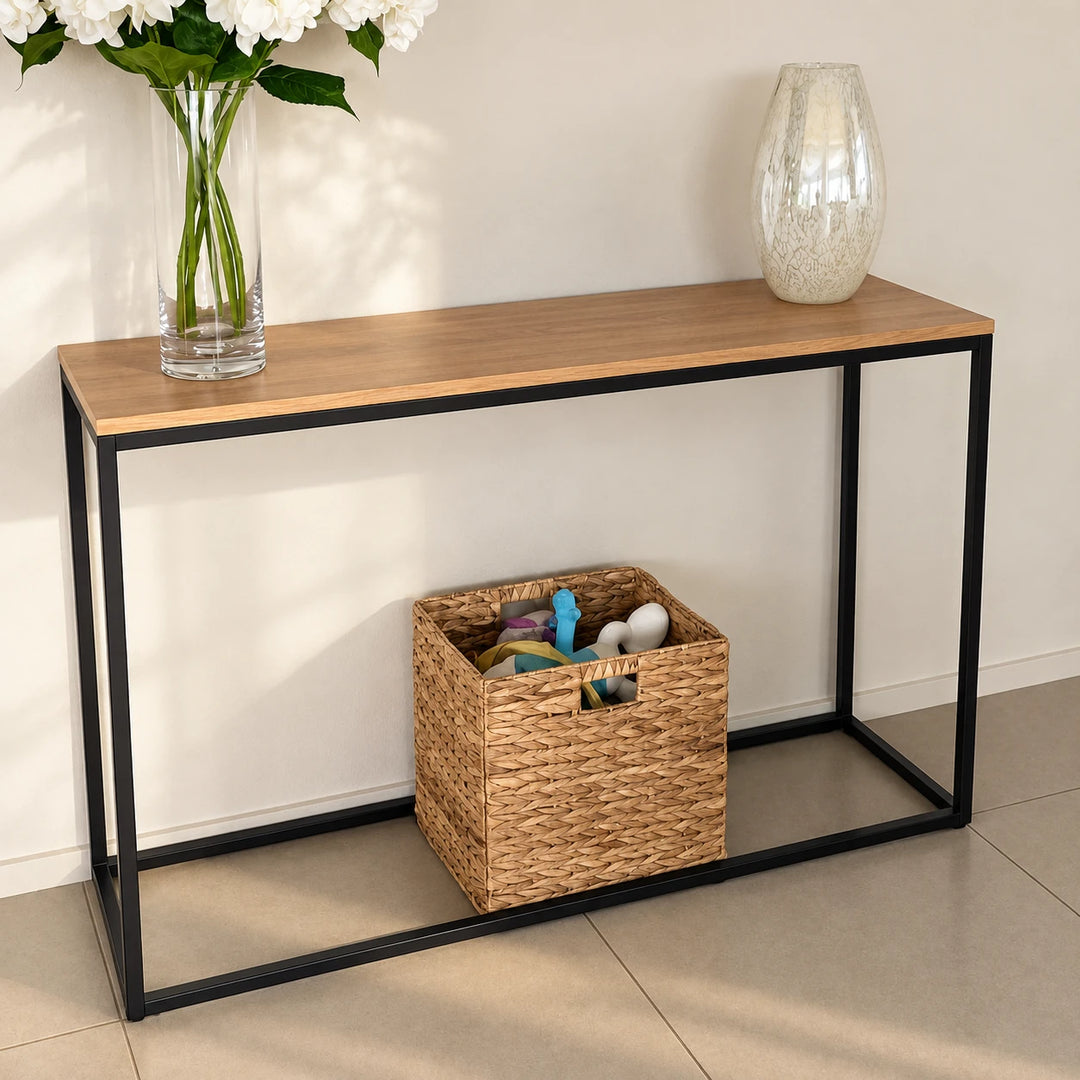 Joolihome slim console table with brown top and black open frame in natural daylight