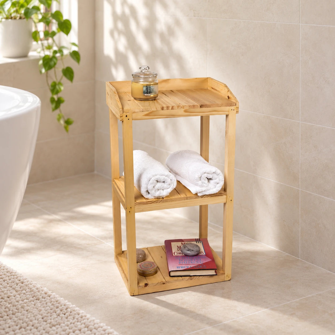 Wooden three-tier shelf in a sunlit bathroom