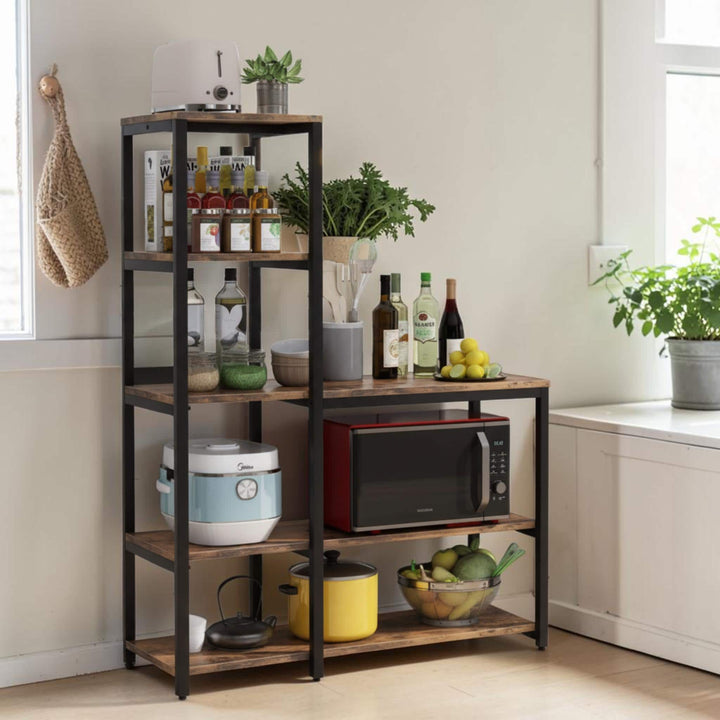 Five-tier appliance rack holding microwave, cookware and pantry essentials