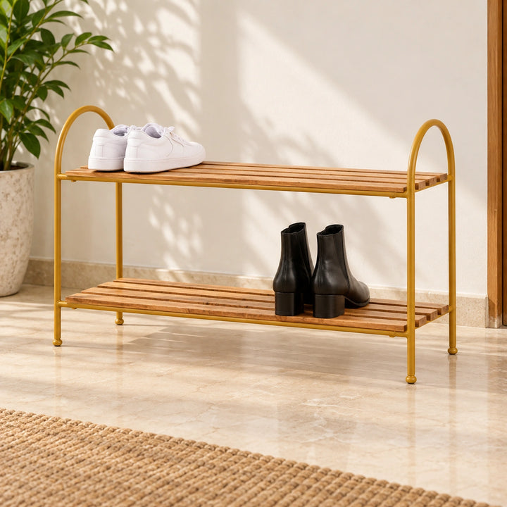 Modern Living two-tier wooden slat shoe rack with Akil Gold powder-coated round metal frame in a sunlit entryway