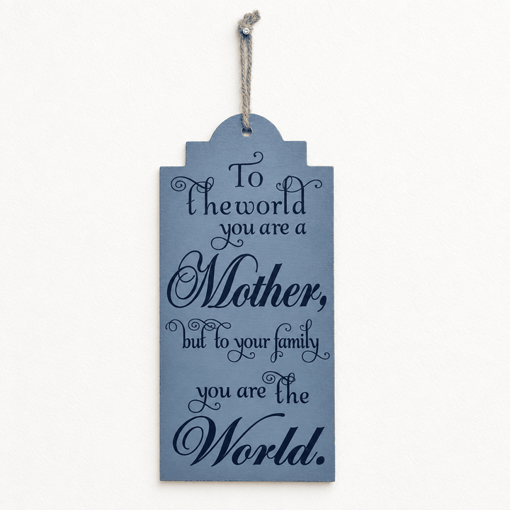 Grey tag-shaped hanging wall plaque with Mother quote in white lettering, front view
