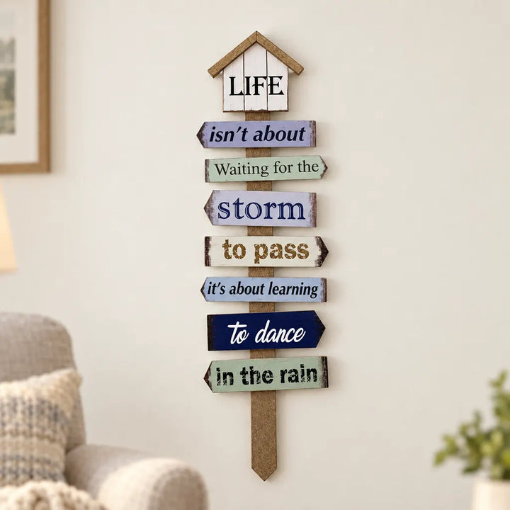 Beige and brown signpost wall caption decor with Life and storm quote beside armchair