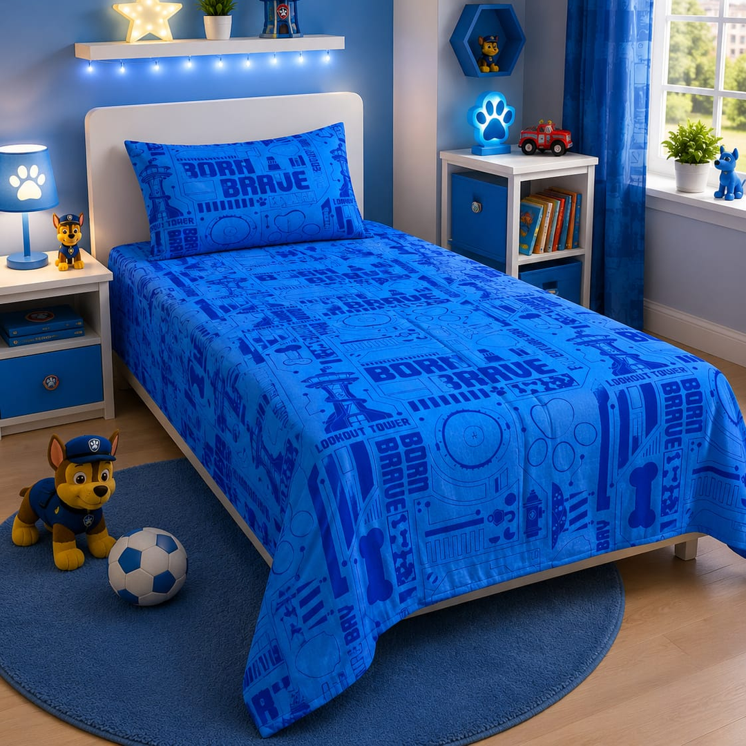 Blue kids single bed sheet with Born Brave badge and tower print