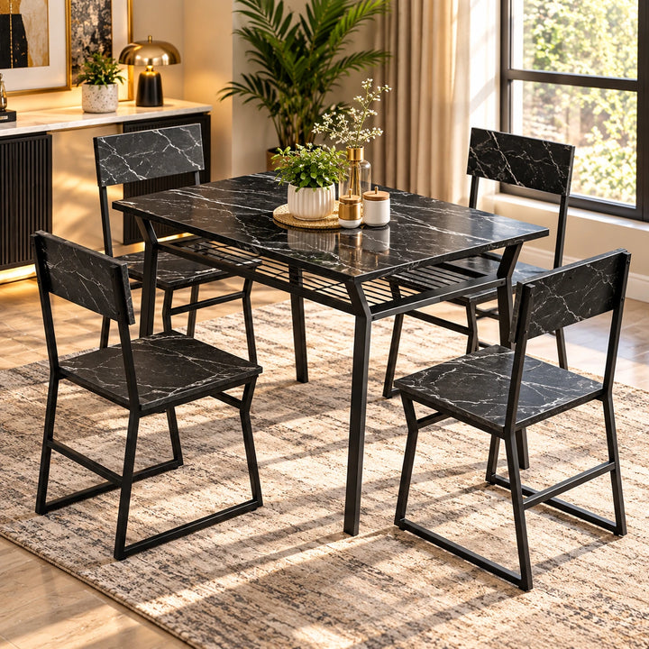 Black marble-look dining table with four matching chairs and black frames