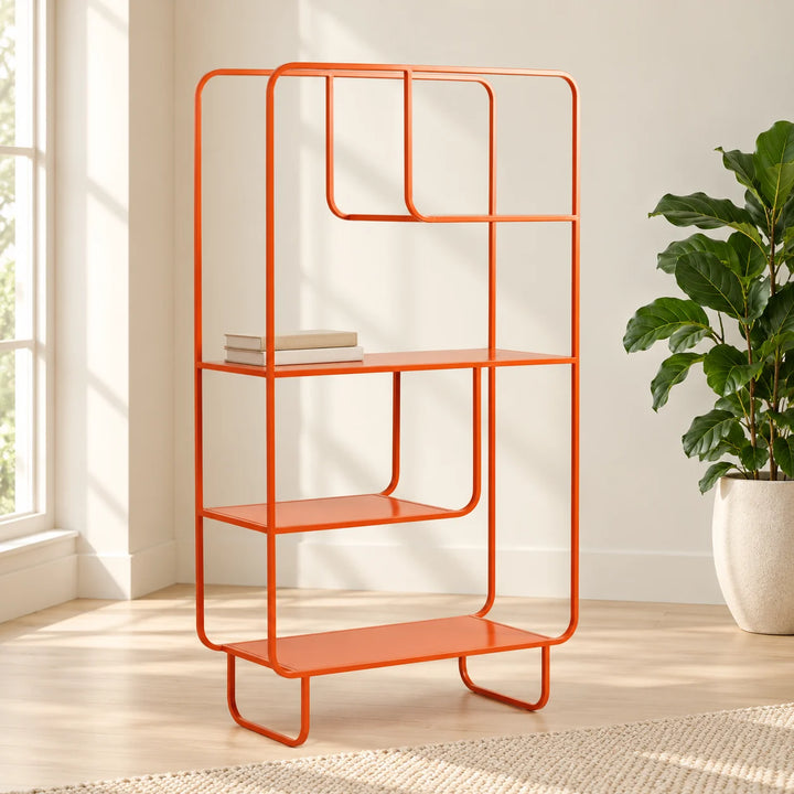 Orange geometric three-shelf bookcase in a natural-light reading nook with books and a natural plant