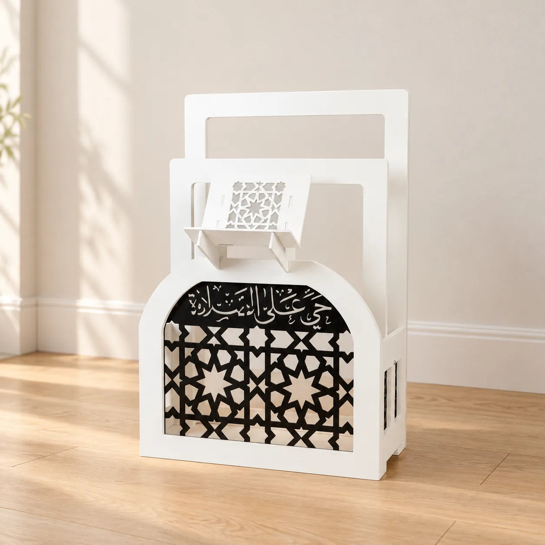 Prayer Rug and Quran Holder Stand Rack, White / Black, empty in a quiet home corner
