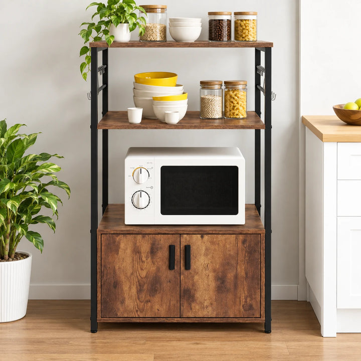 Premwati brown wood and black metal kitchen rack with two-door cabinet, microwave, jars and plant against a wall