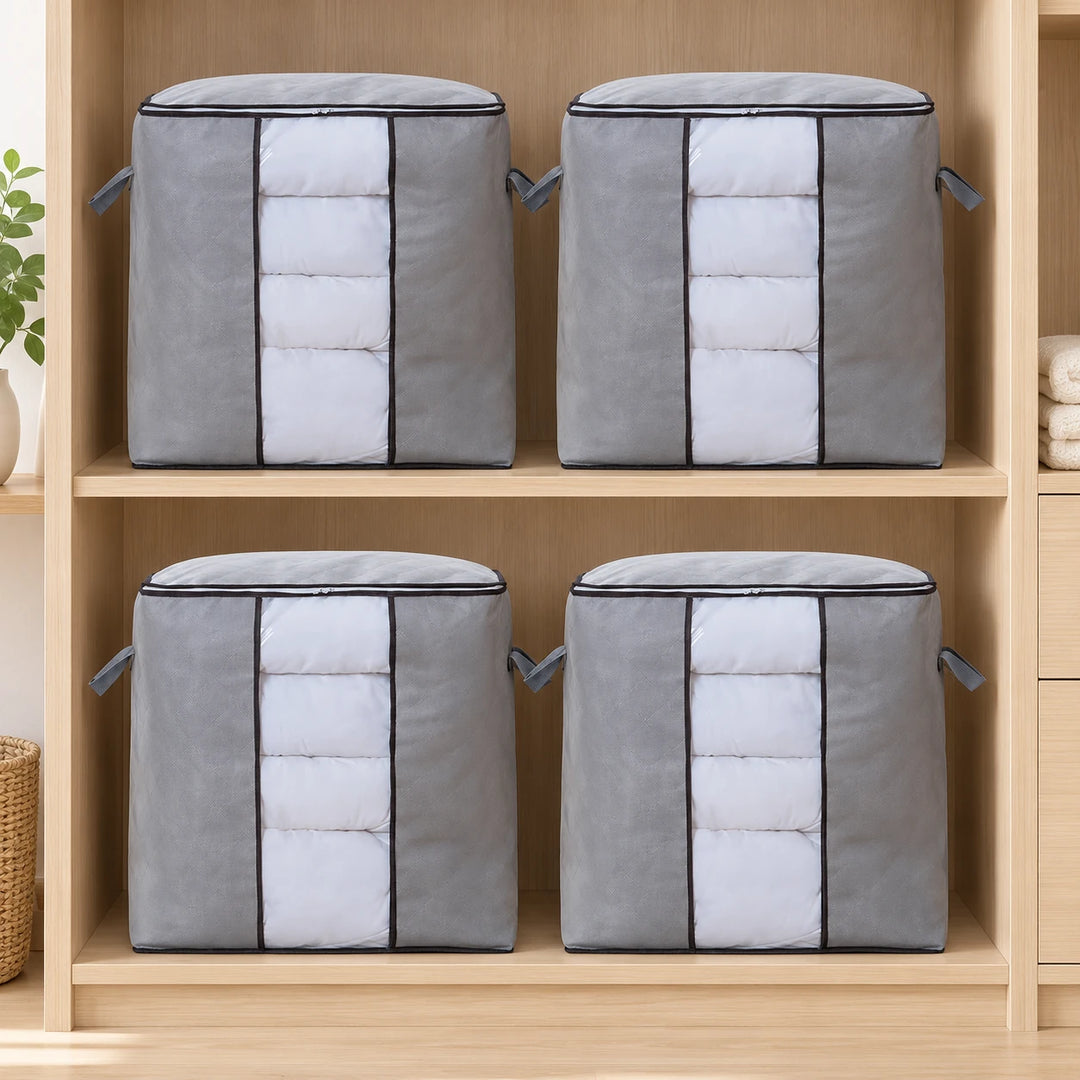 Four grey quilt storage bags arranged on wooden shelves