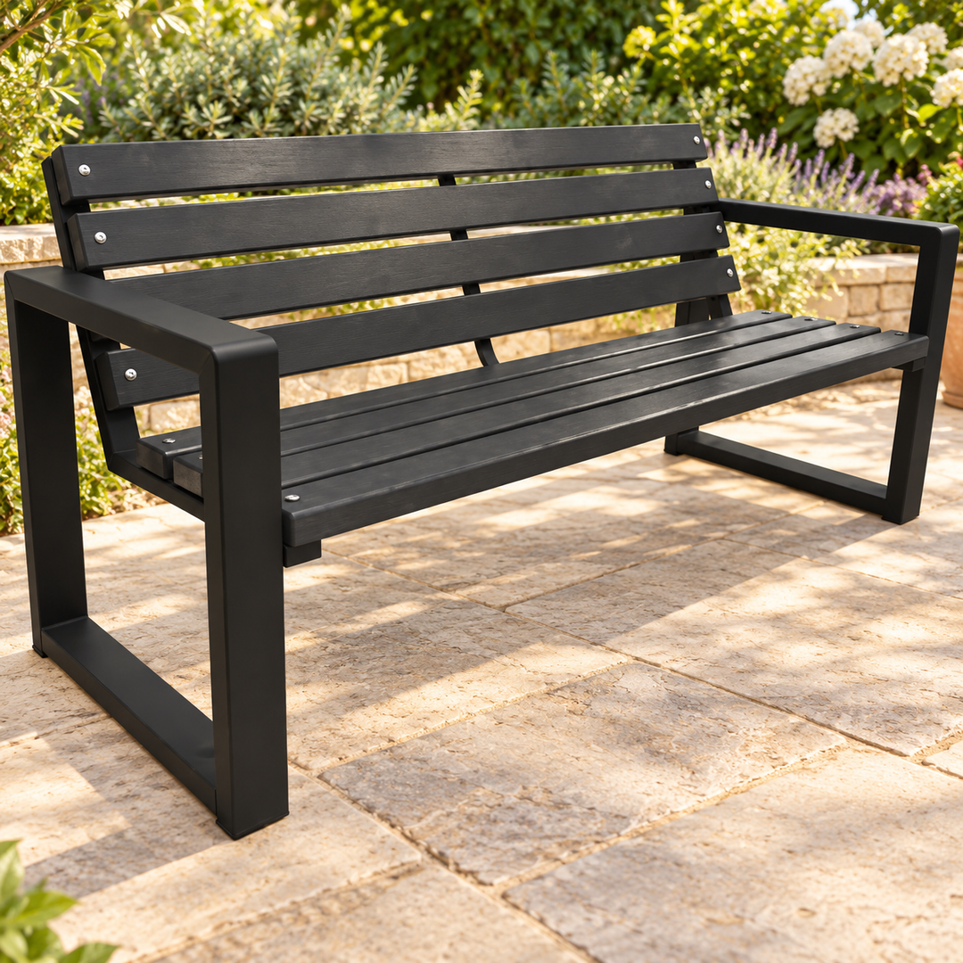 Black Qulsora slatted garden bench with armrests on a sunlit garden terrace