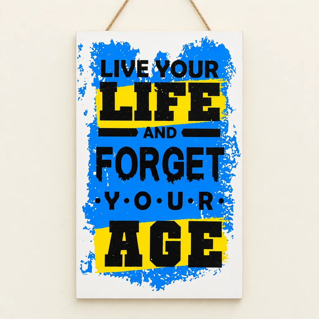 Close-up of Live Your Life and Forget Your Age wall plaque with blue splash design
