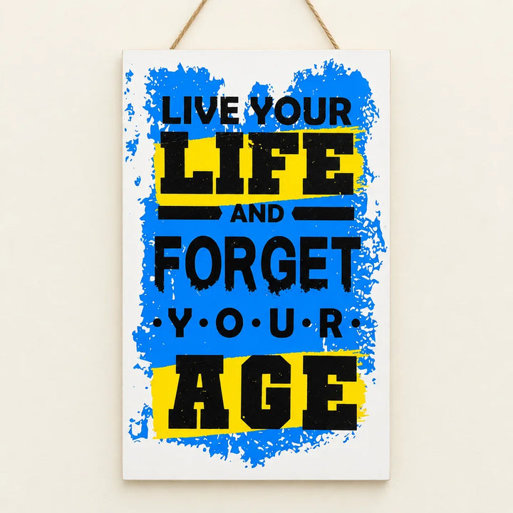 Close-up of Live Your Life and Forget Your Age wall plaque with blue splash design