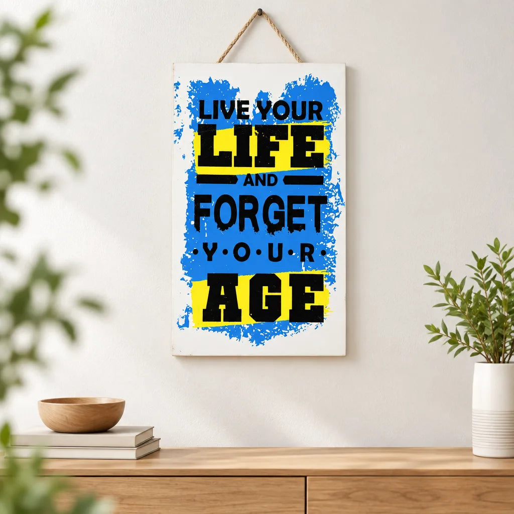 White and blue wall caption decor reading Live Your Life and Forget Your Age in room