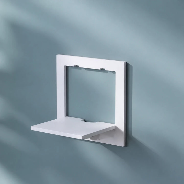 One white square wall-mounted shelf on a blue-grey wall
