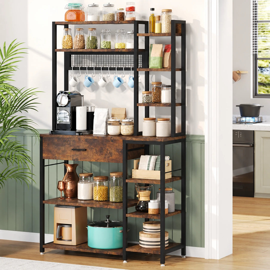 Shaka rustic brown and black kitchen bakers rack with pantry and coffee accessories, in a naturally lit kitchen