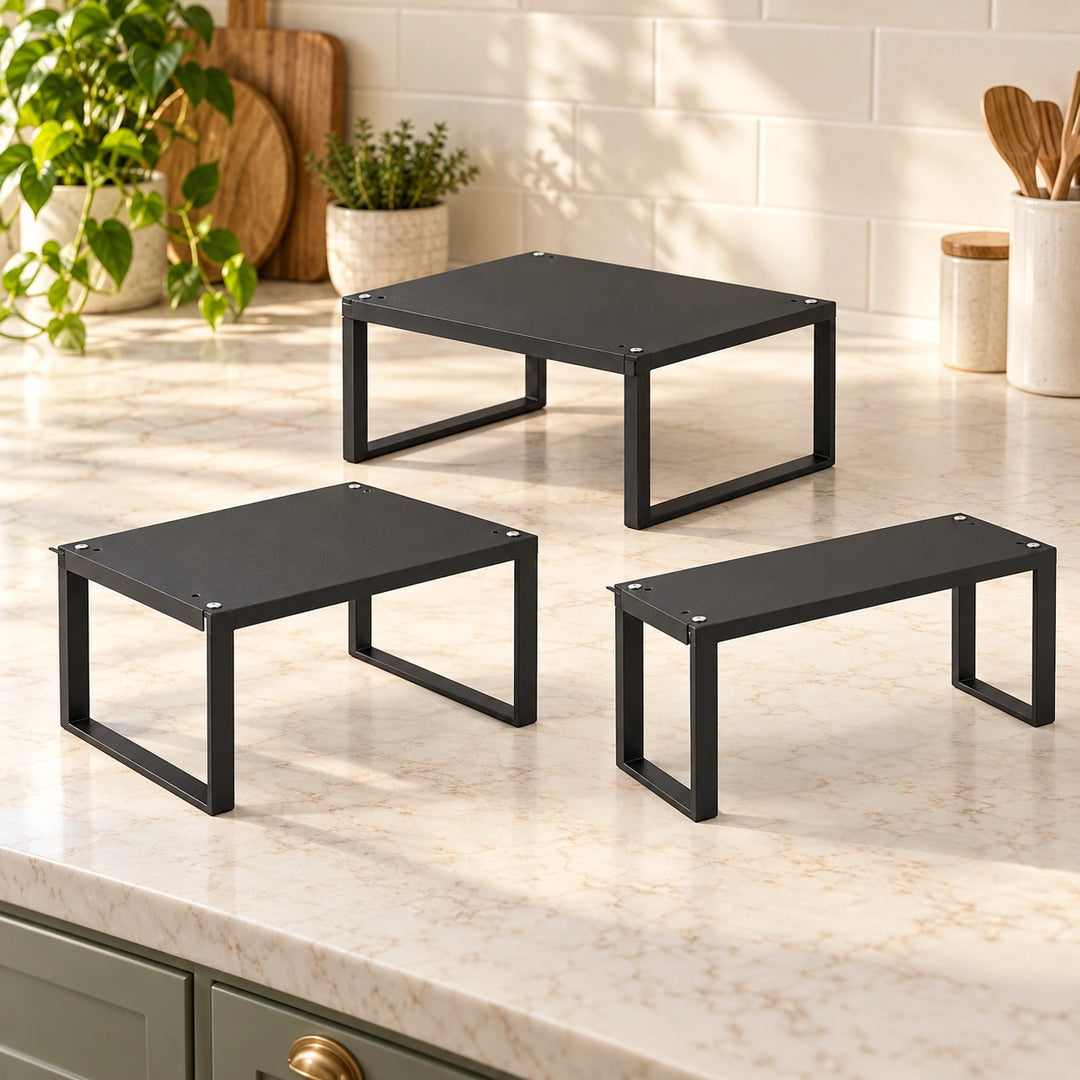 Set of three equal-height black Sintio kitchen racks with different depths