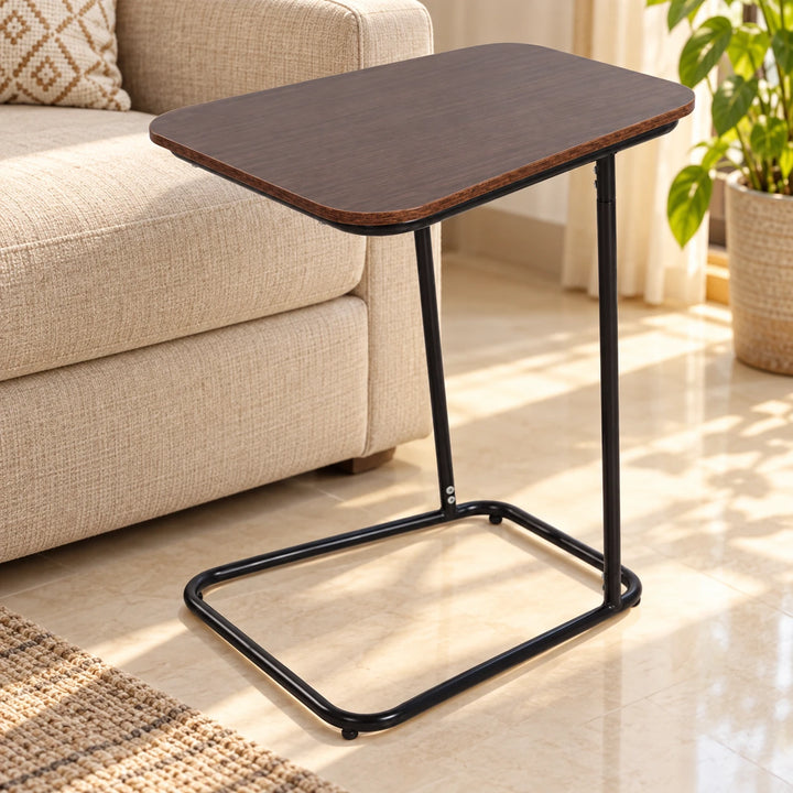 Sleek Line Dark Brown tapered wood-top side table with black tubular C-frame beside a sofa