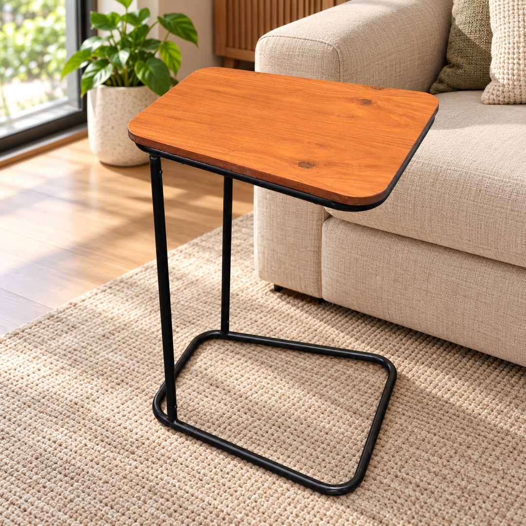 Sleek Line Brown side table with rounded wood top and slim black tubular frame beside a sofa