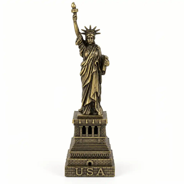 Antique bronze Statue of Liberty decor figurine with USA base, front view on white
