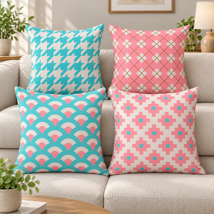 Four Still and Stall cushion covers with pastel houndstooth, argyle, fan and cross prints on a sofa