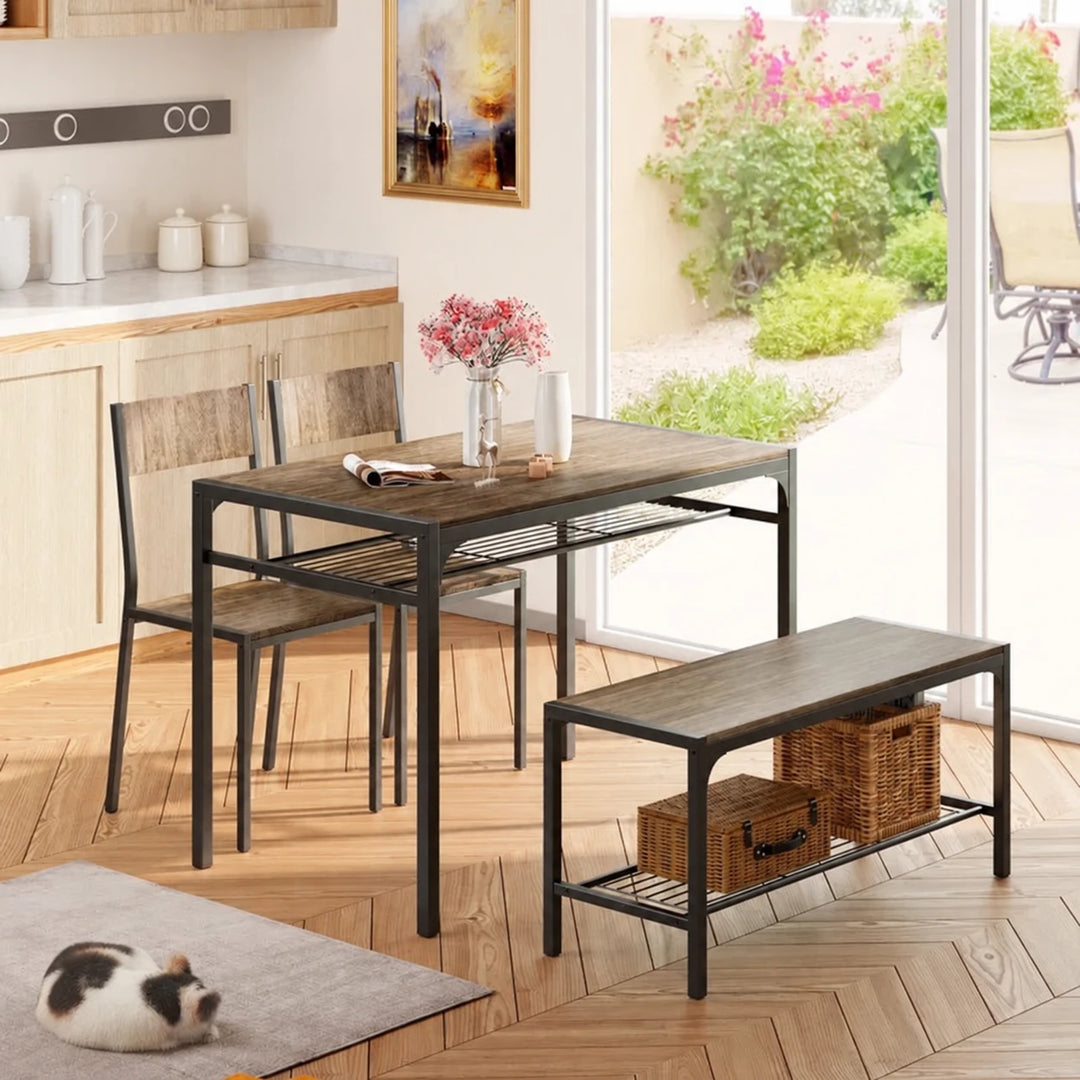 Tamajah wood dining set with table, two chairs and storage bench in a sunlit kitchen