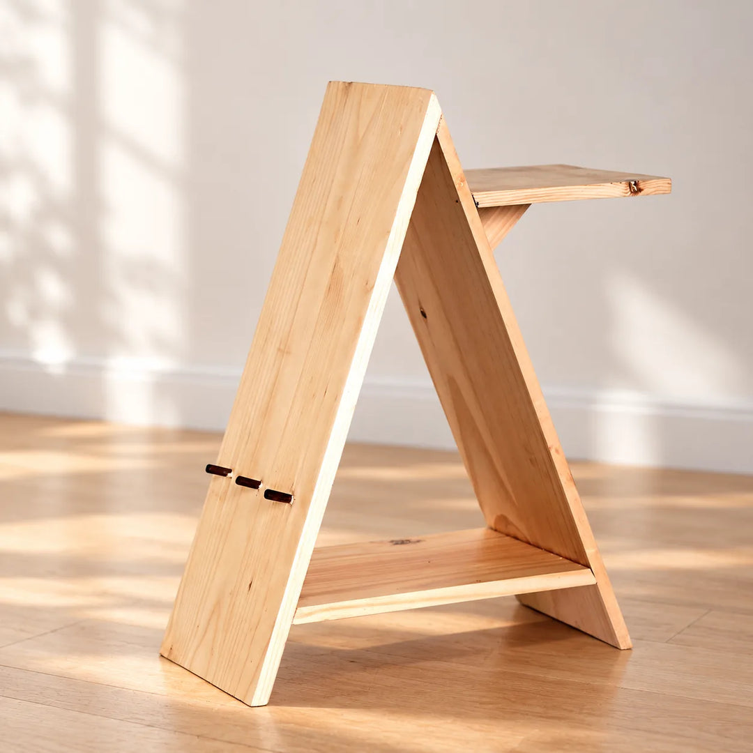 Triangle Decor solid wood side table in a lounge setting